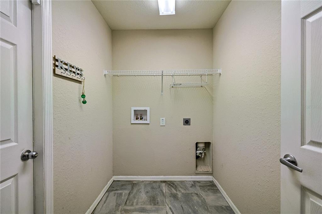 6367 Southwest 117th St Road Ocala, FL 34476 - Photo 23 of 43 a view of utility room