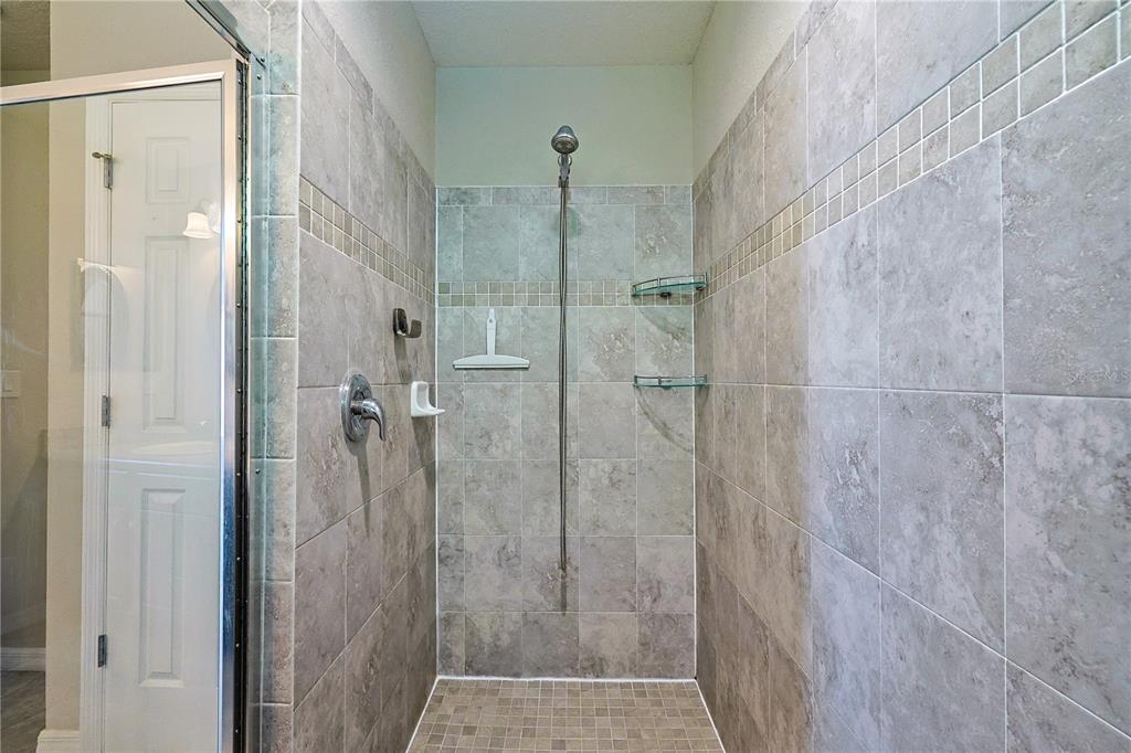 6367 Southwest 117th St Road Ocala, FL 34476 - Photo 27 of 43 a bathroom with a shower