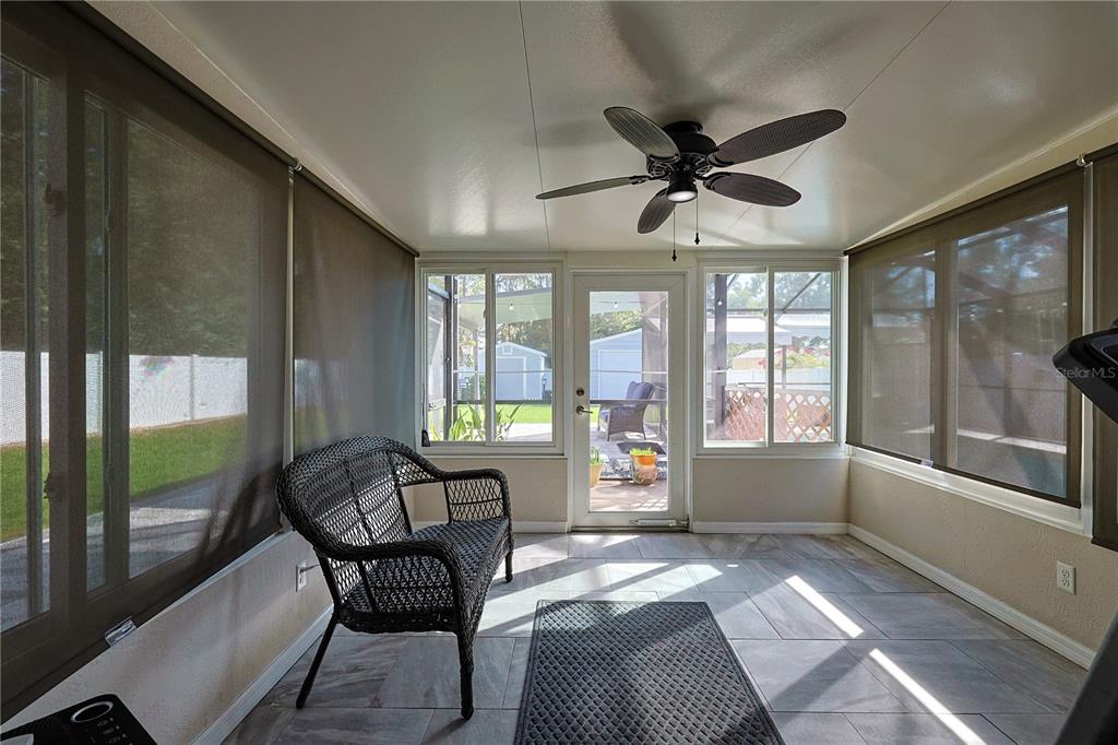 6367 Southwest 117th St Road Ocala, FL 34476 - Photo 29 of 43 a view of a livingroom with furniture and windows