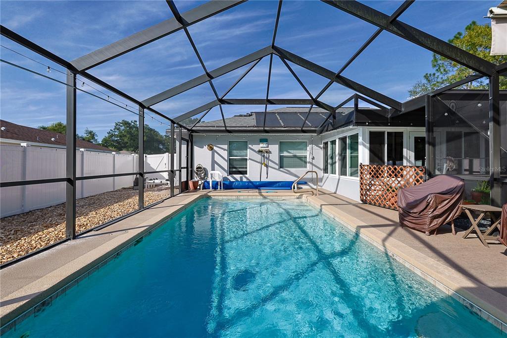 6367 Southwest 117th St Road Ocala, FL 34476 - Photo 34 of 43 a view of a backyard with sitting area