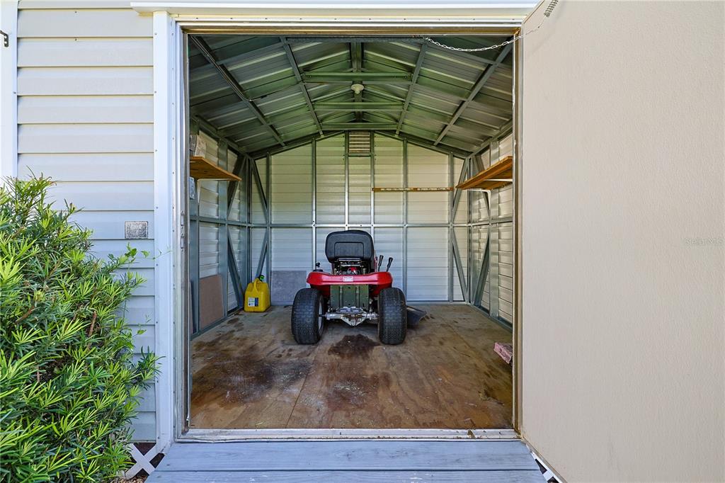 6367 Southwest 117th St Road Ocala, FL 34476 - Photo 36 of 43 a small garden covered with tall trees