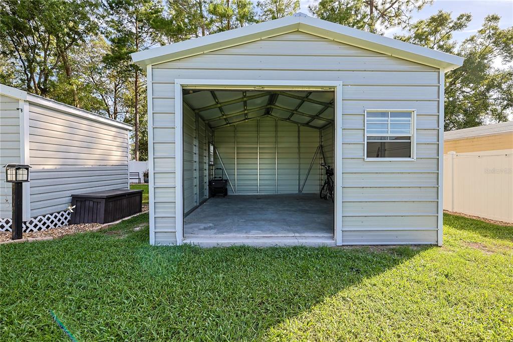 6367 Southwest 117th St Road Ocala, FL 34476 - Photo 37 of 43 a front view of a house with a yard