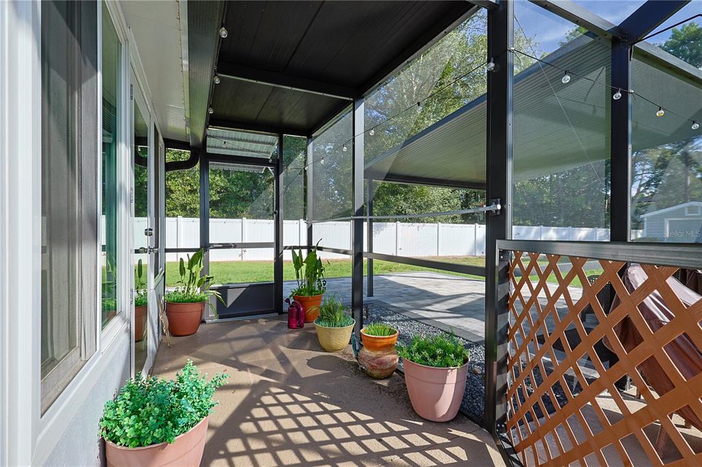 6367 Southwest 117th St Road Ocala, FL 34476 - Photo 39 of 43 a garden view with a seating space