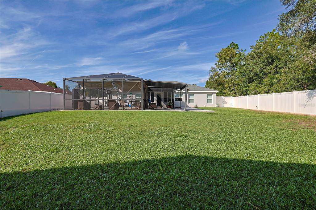 6367 Southwest 117th St Road Ocala, FL 34476 - Photo 43 of 43 a view of a house with a big yard