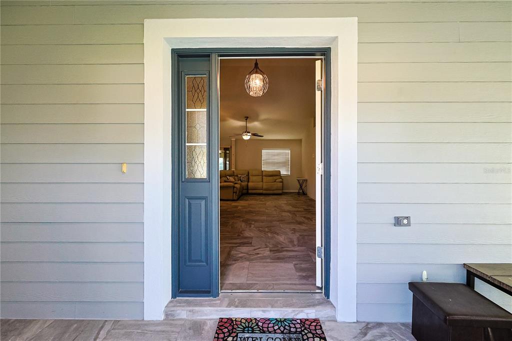 6367 Southwest 117th St Road Ocala, FL 34476 - Photo 5 of 43 a view of front door door and a mirror