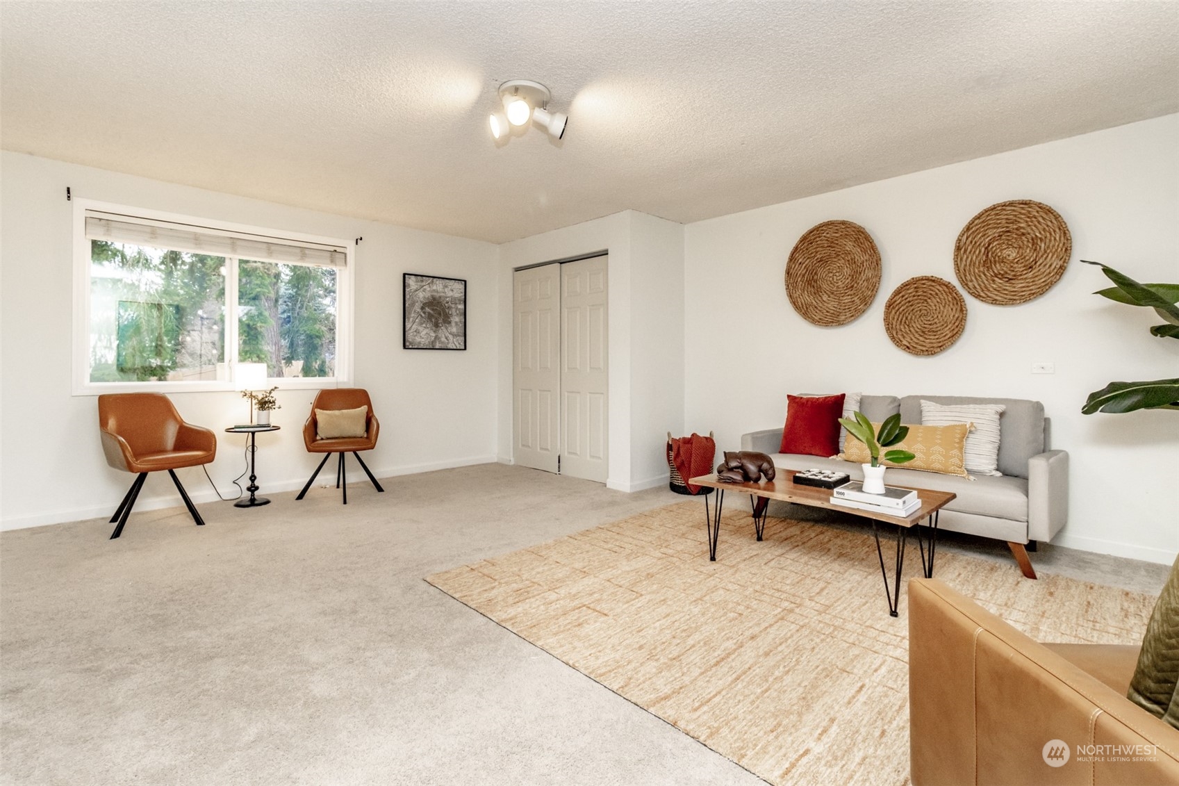 15602 Southeast 178th Street Renton, WA 98058 - Photo 17 of 29 a living room with furniture and a large window