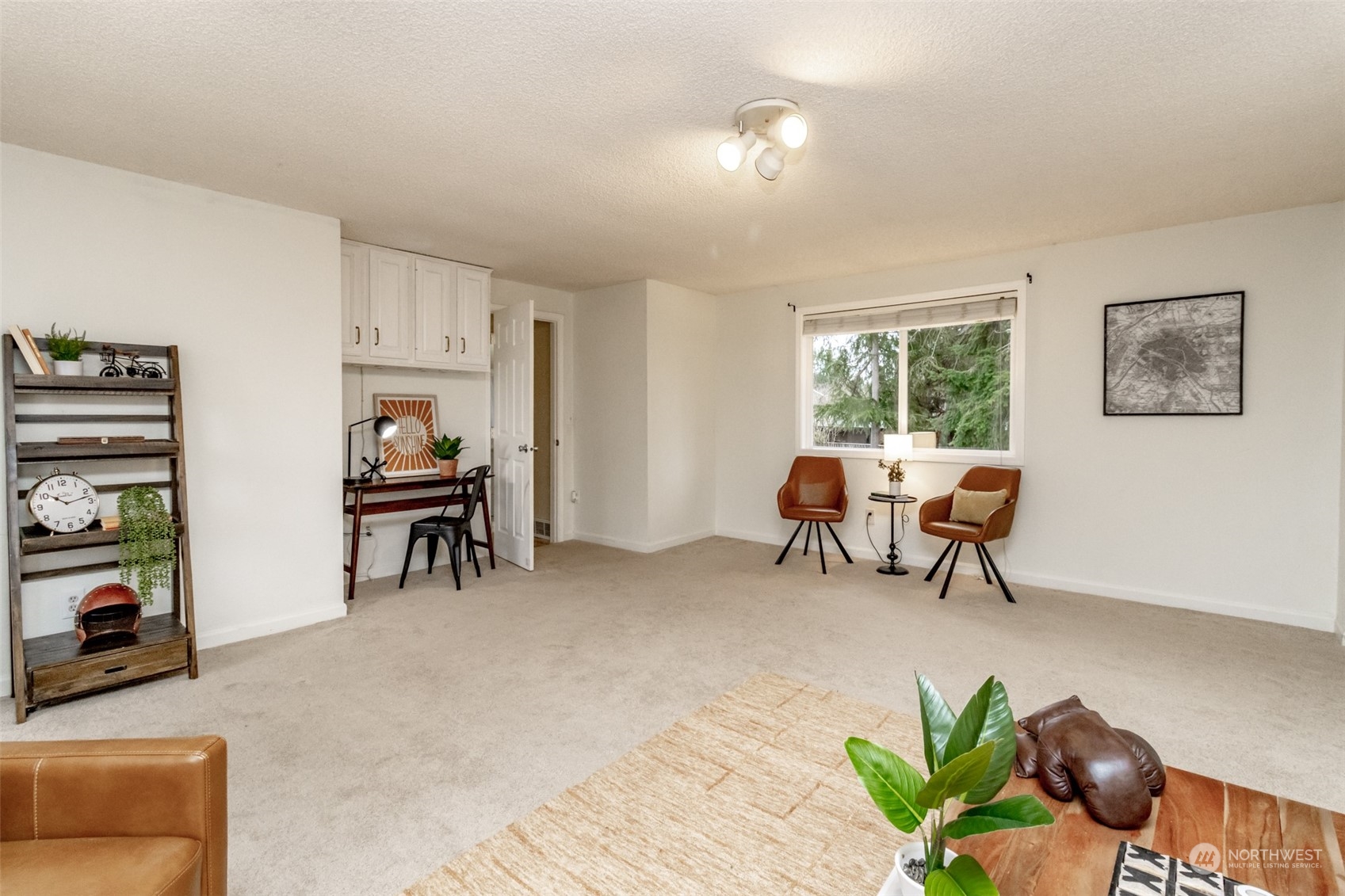 15602 Southeast 178th Street Renton, WA 98058 - Photo 18 of 29 a living room with furniture and a window