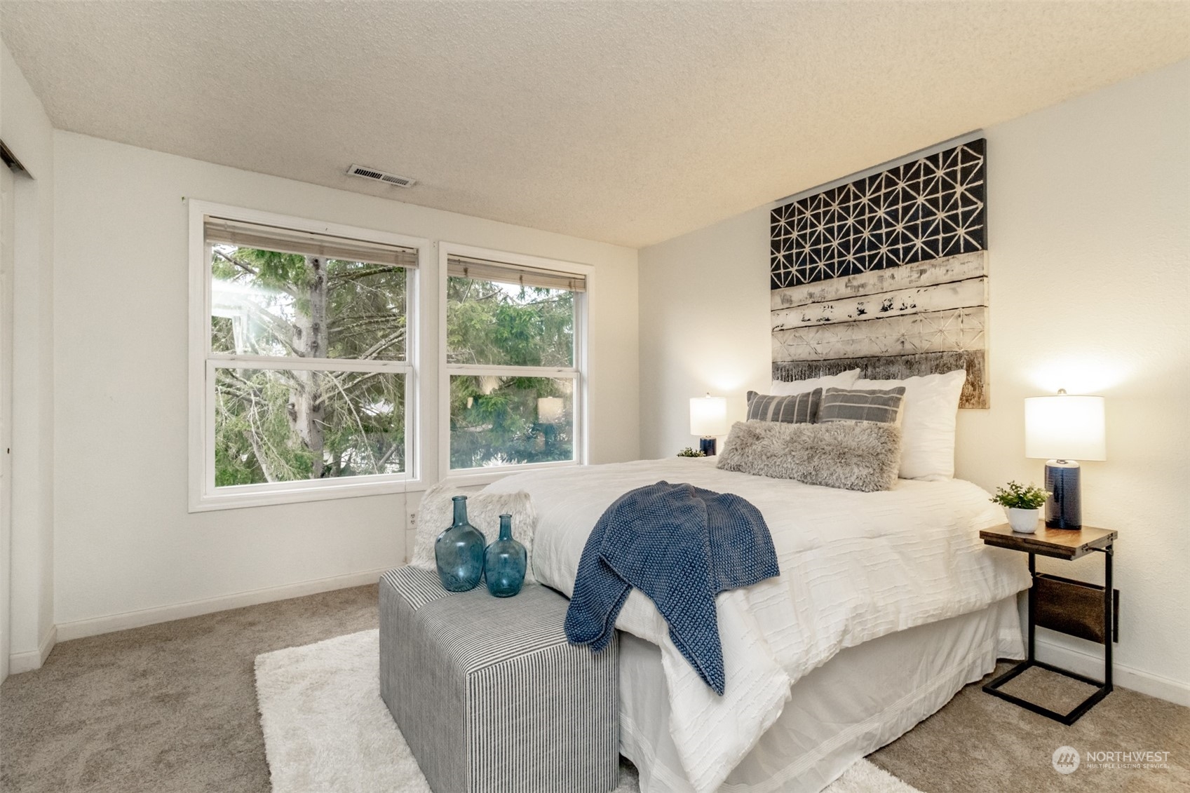 15602 Southeast 178th Street Renton, WA 98058 - Photo 20 of 29 a bedroom with a bed and wooden floor