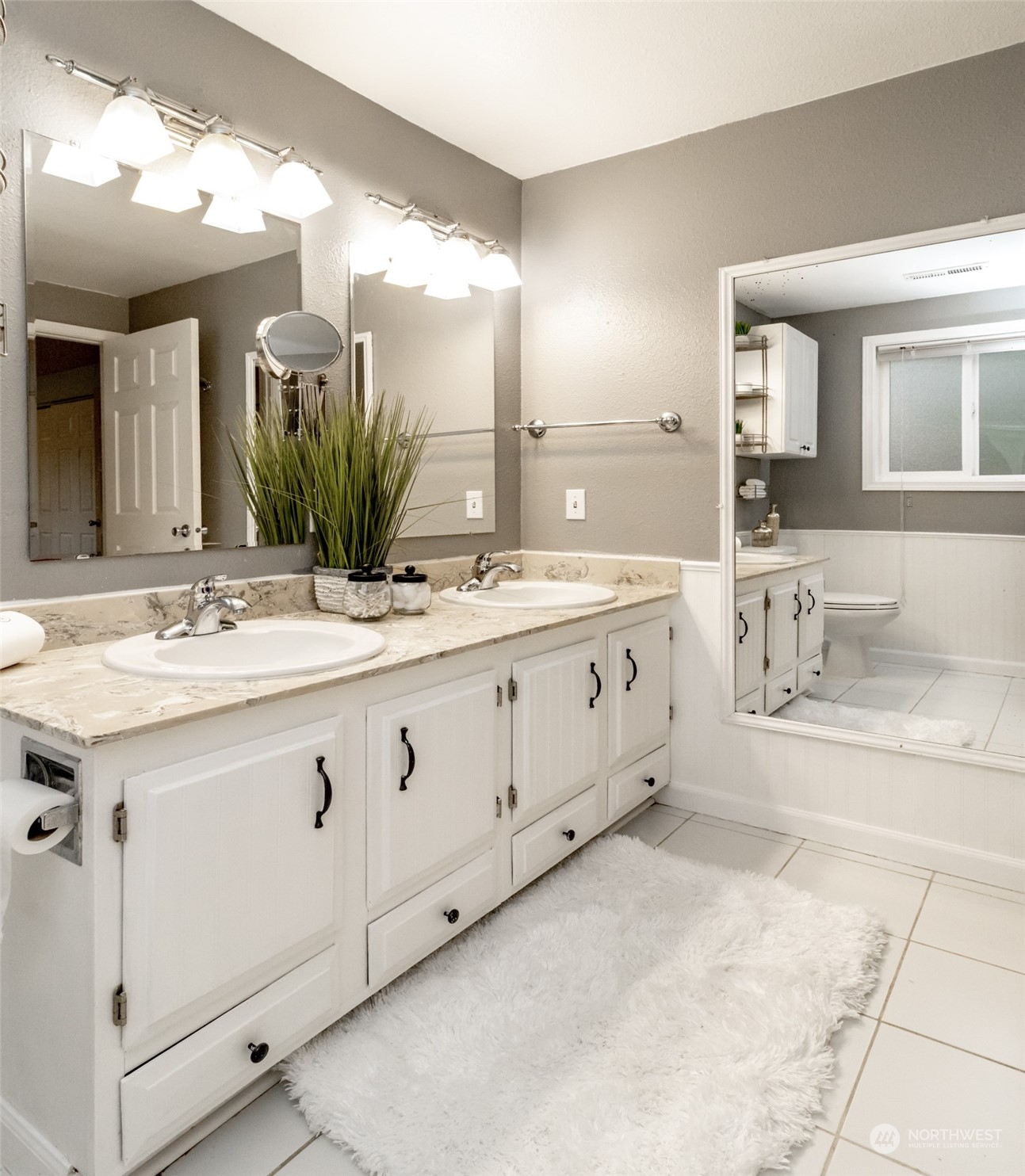 15602 Southeast 178th Street Renton, WA 98058 - Photo 24 of 29 a spacious bathroom with a double vanity sink mirror and