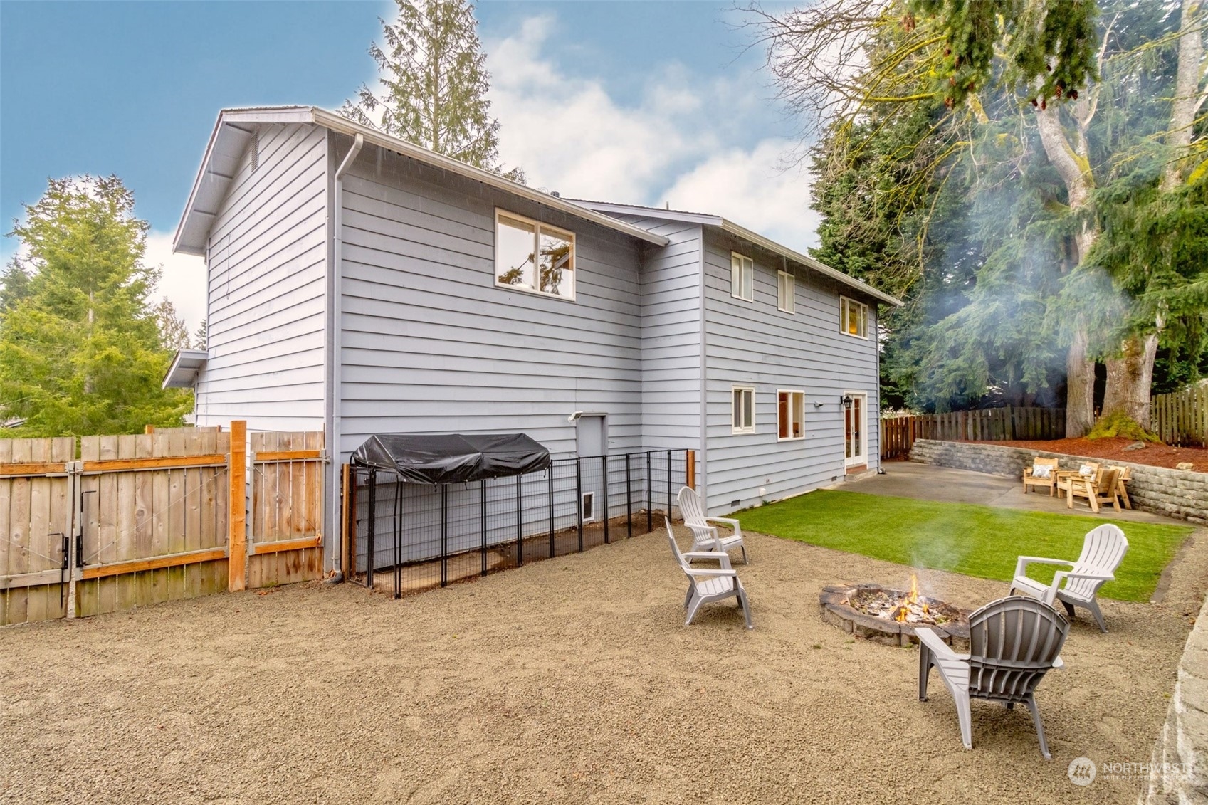 15602 Southeast 178th Street Renton, WA 98058 - Photo 28 of 29 a backyard of a house with outdoor seating