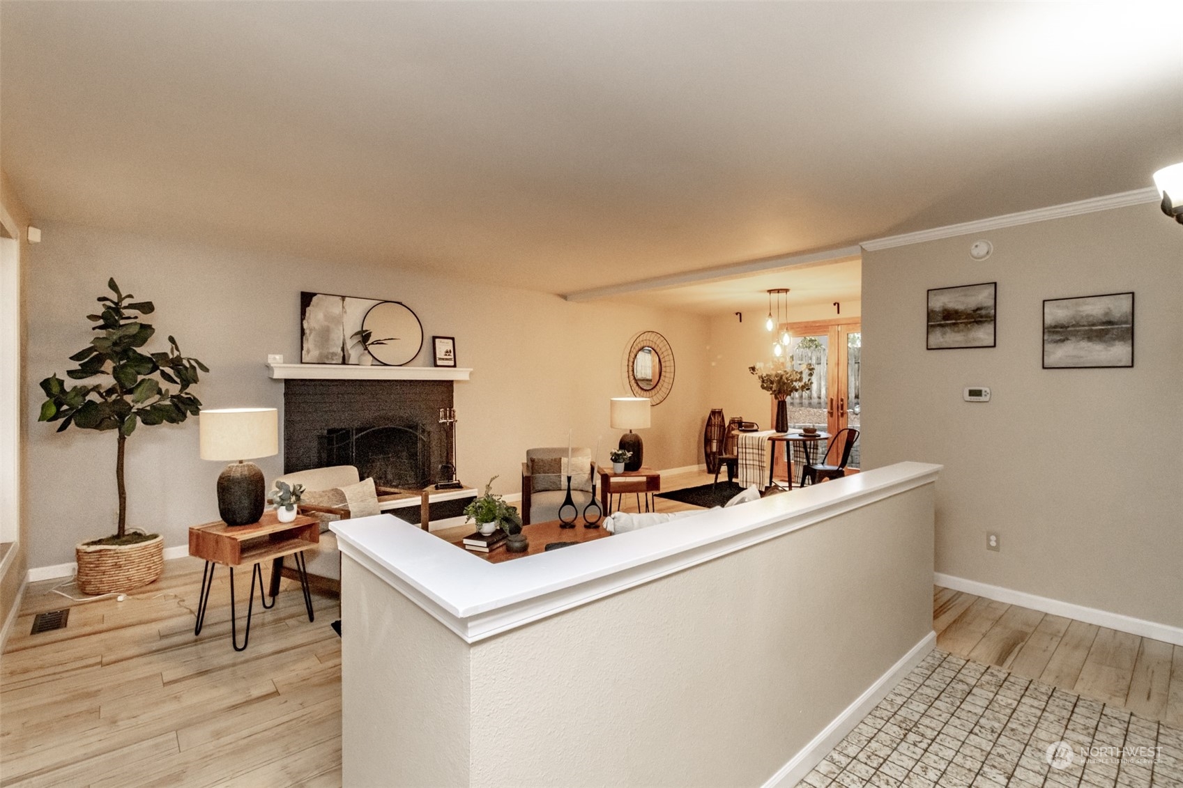 15602 Southeast 178th Street Renton, WA 98058 - Photo 4 of 29 a living room with furniture and a fireplace