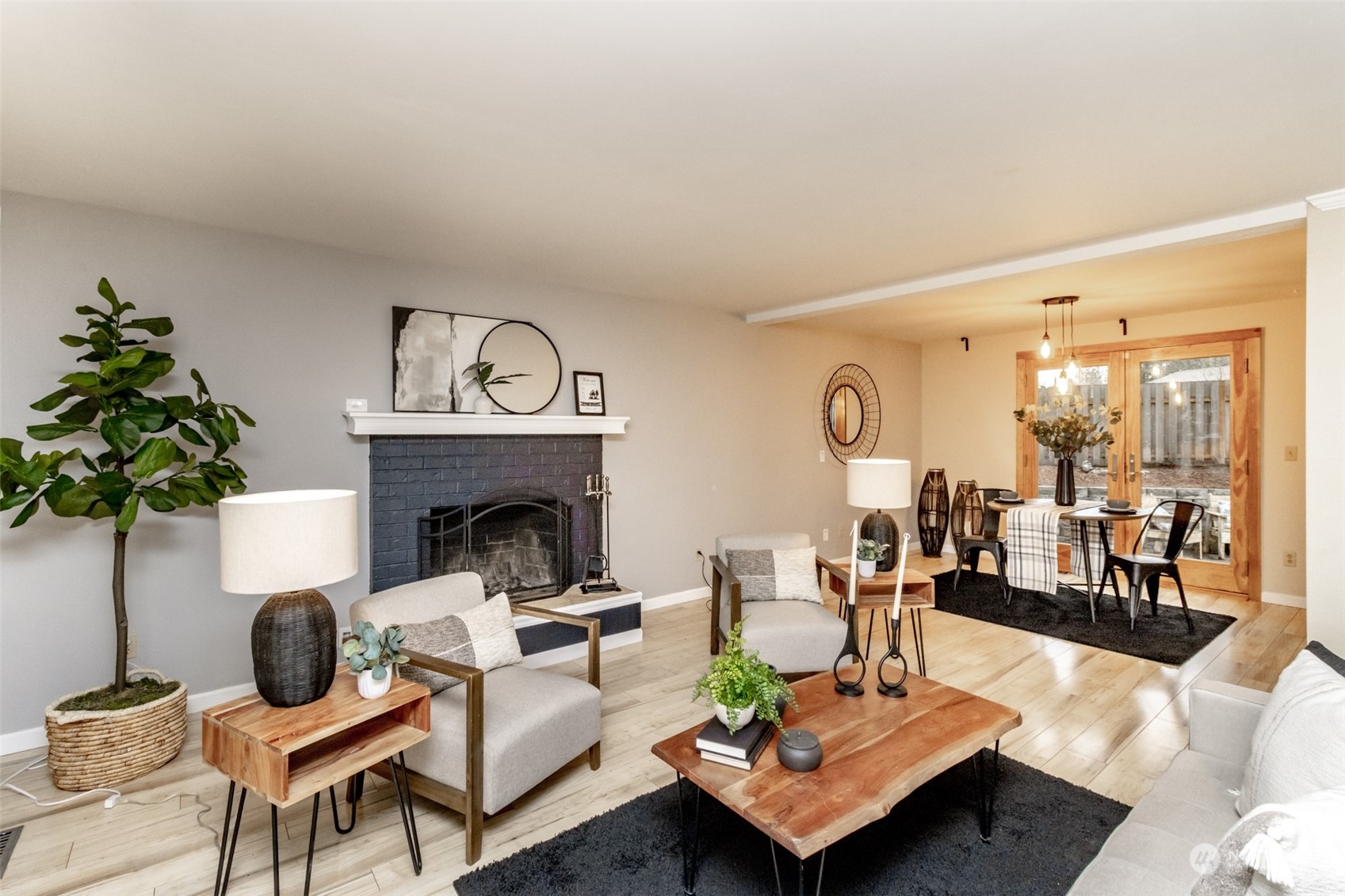 15602 Southeast 178th Street Renton, WA 98058 - Photo 5 of 29 a living room with furniture and a fireplace