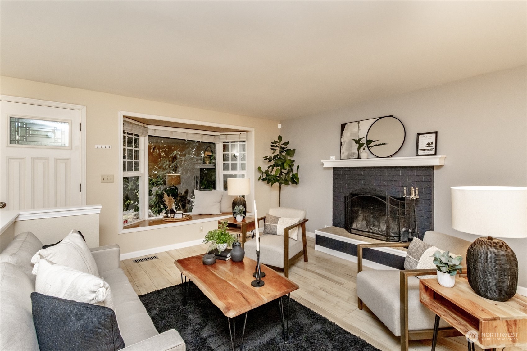 15602 Southeast 178th Street Renton, WA 98058 - Photo 6 of 29 a living room with furniture and a fireplace