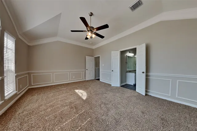 an empty room with a empty space and windows