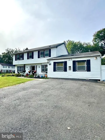 a view of house with outdoor space