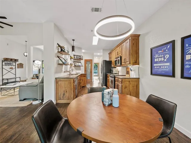 a view of a dining room with furniture