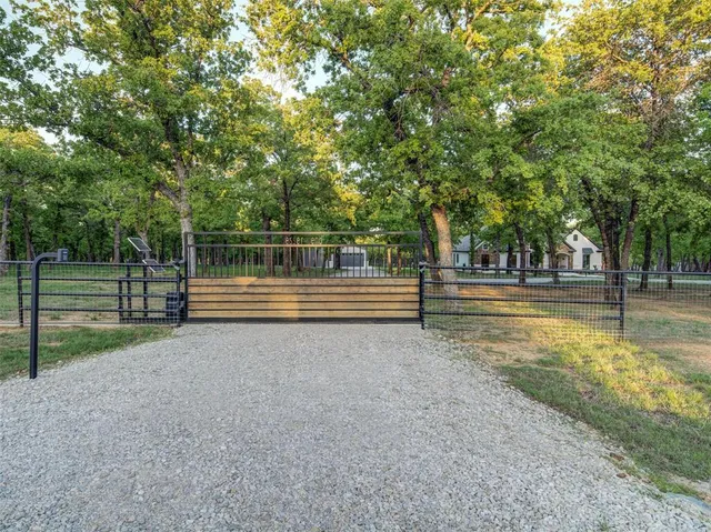 a view of backyard with green space