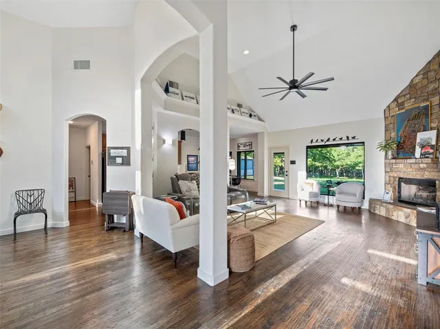 a view of living room with furniture and a large window