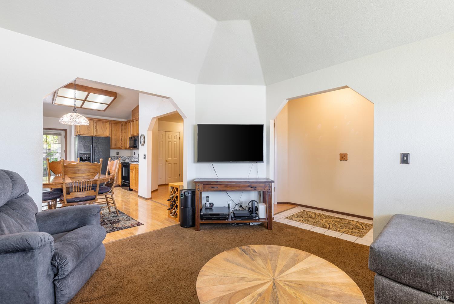 1935 Seville Street Santa Rosa, CA 95403 - Photo 25 of 30 a living room with furniture and a flat screen tv