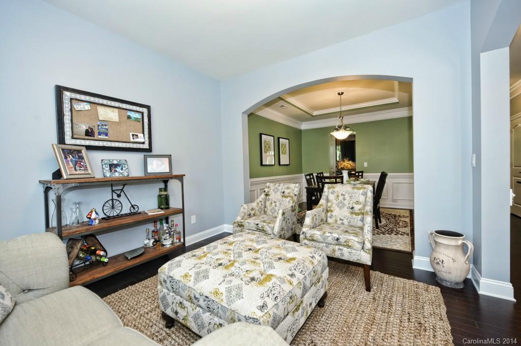4002 Fallondale Road Waxhaw, NC 28173 - Photo 3 of 24 a bedroom with furniture and a wooden floor