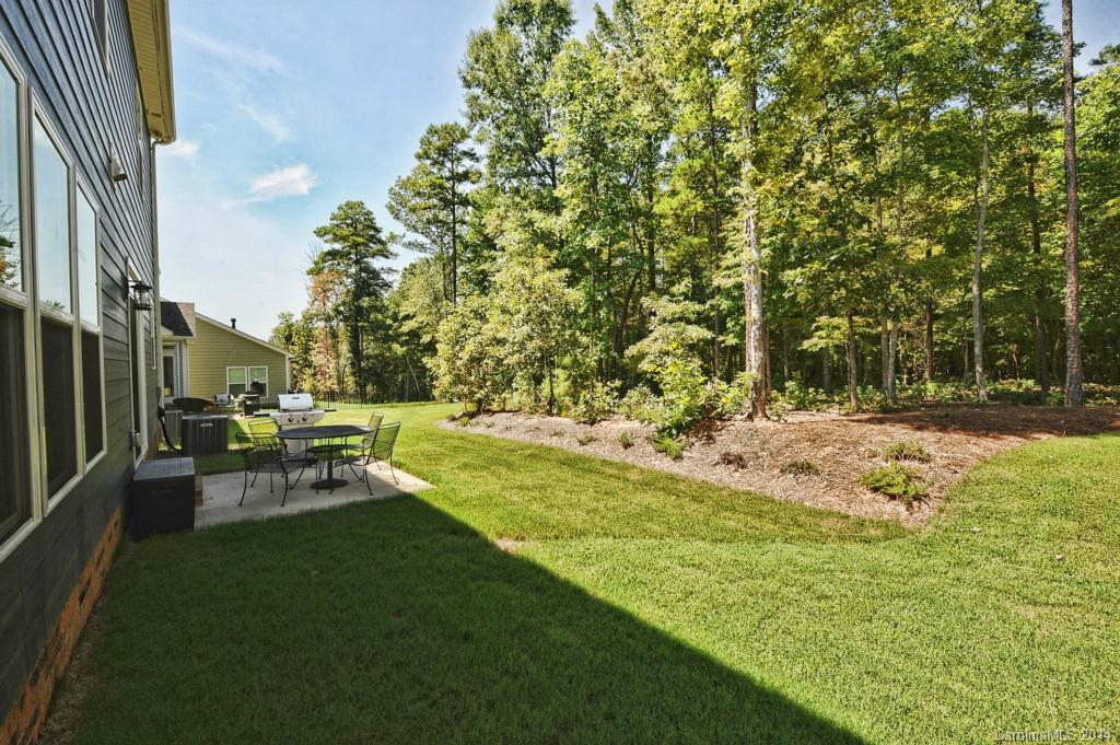 4002 Fallondale Road Waxhaw, NC 28173 - Photo 23 of 24 a view of yard with swimming pool and sitting area