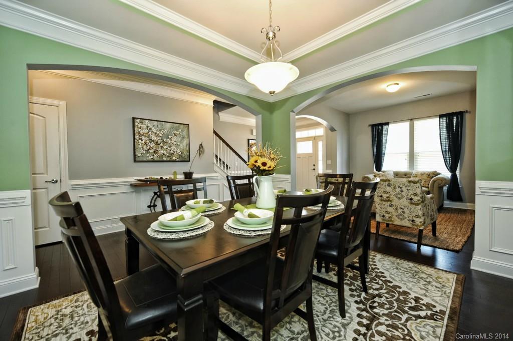 4002 Fallondale Road Waxhaw, NC 28173 - Photo 5 of 24 a view of a dining room with furniture and a chandelier