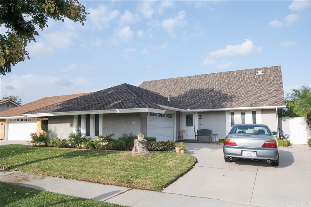 a car parked in front of a house