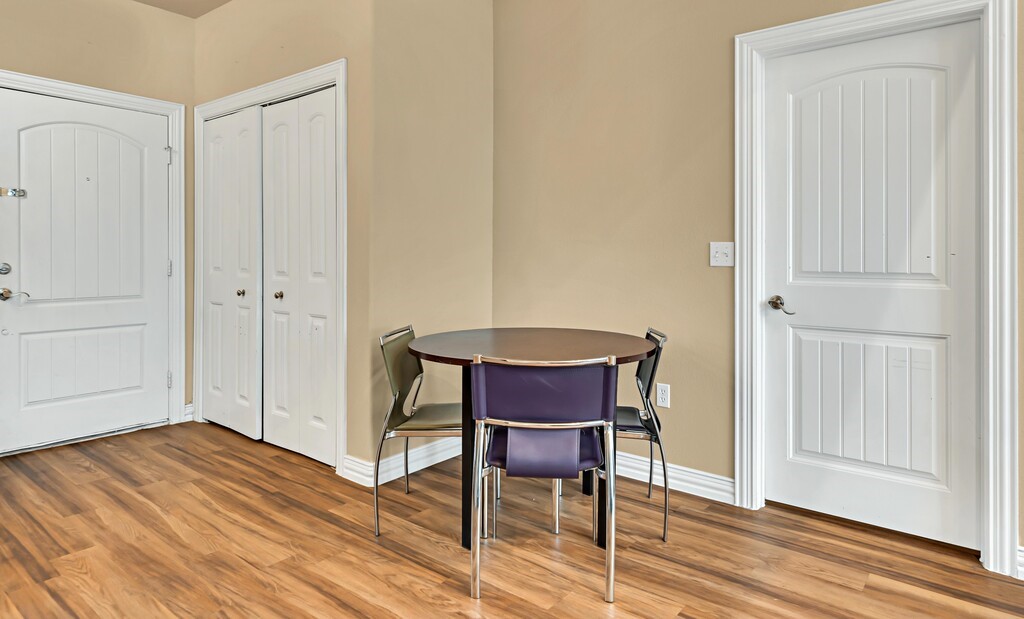 2410 2nd Street South, Unit 1056 Waco, TX 76706 - Photo 13 of 37 a workspace room with wooden floor furniture and windows