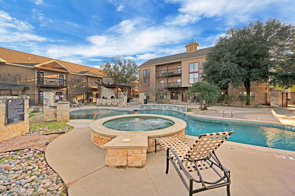 2410 2nd Street South, Unit 1056 Waco, TX 76706 - Photo 28 of 37 a view of a swimming pool with a patio