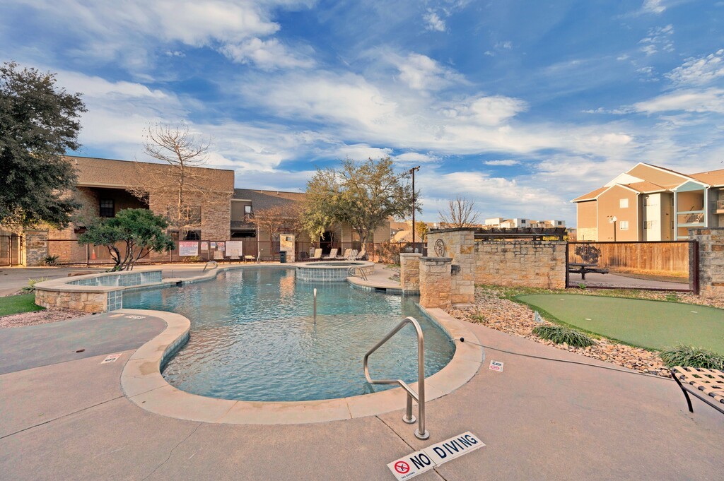 2410 2nd Street South, Unit 1056 Waco, TX 76706 - Photo 30 of 37 a view of a swimming pool with a terrace