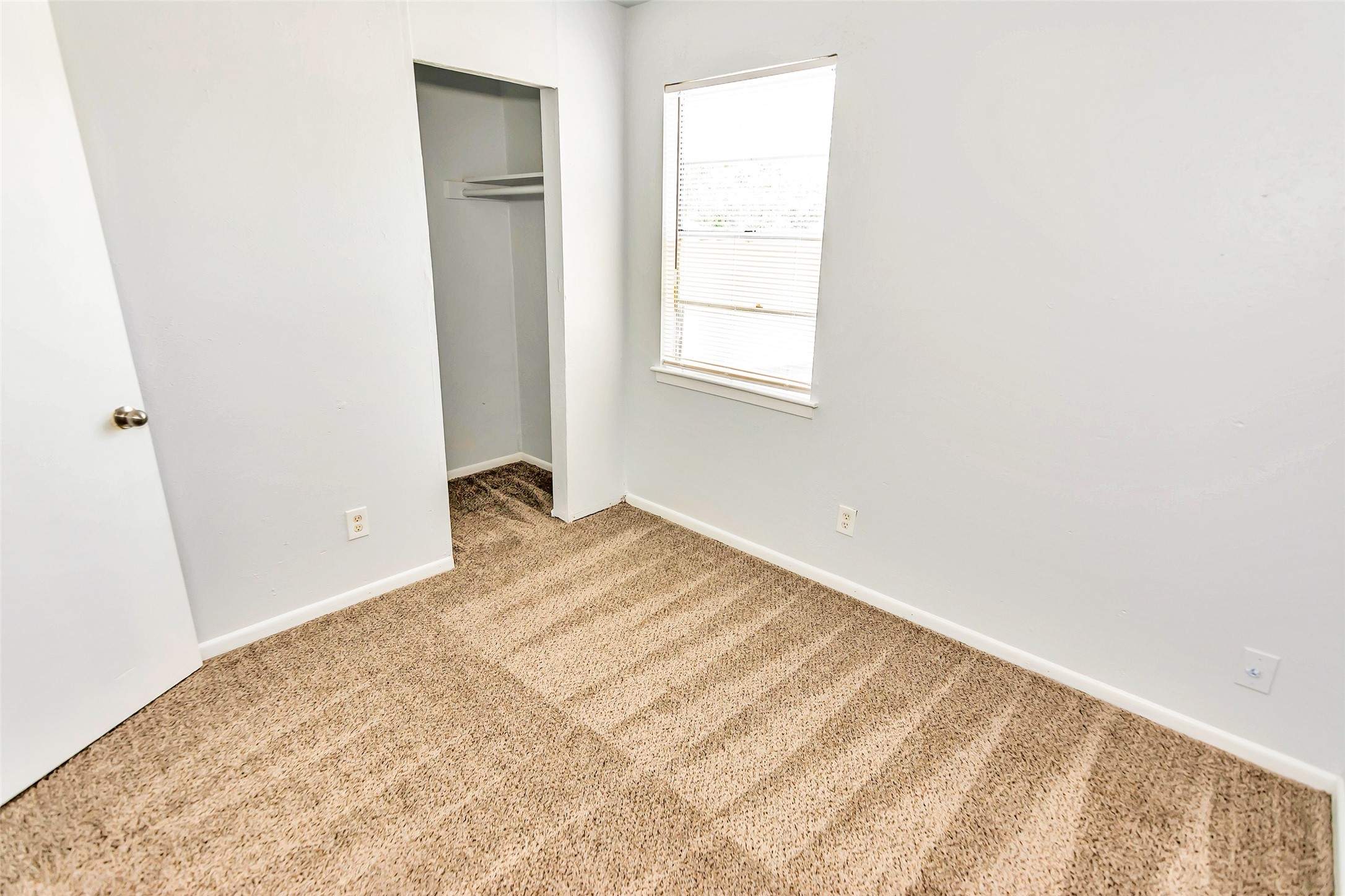 9706 Farragut Street Houston, TX 77078 - Photo 7 of 12 a view of a room that has a bed in it