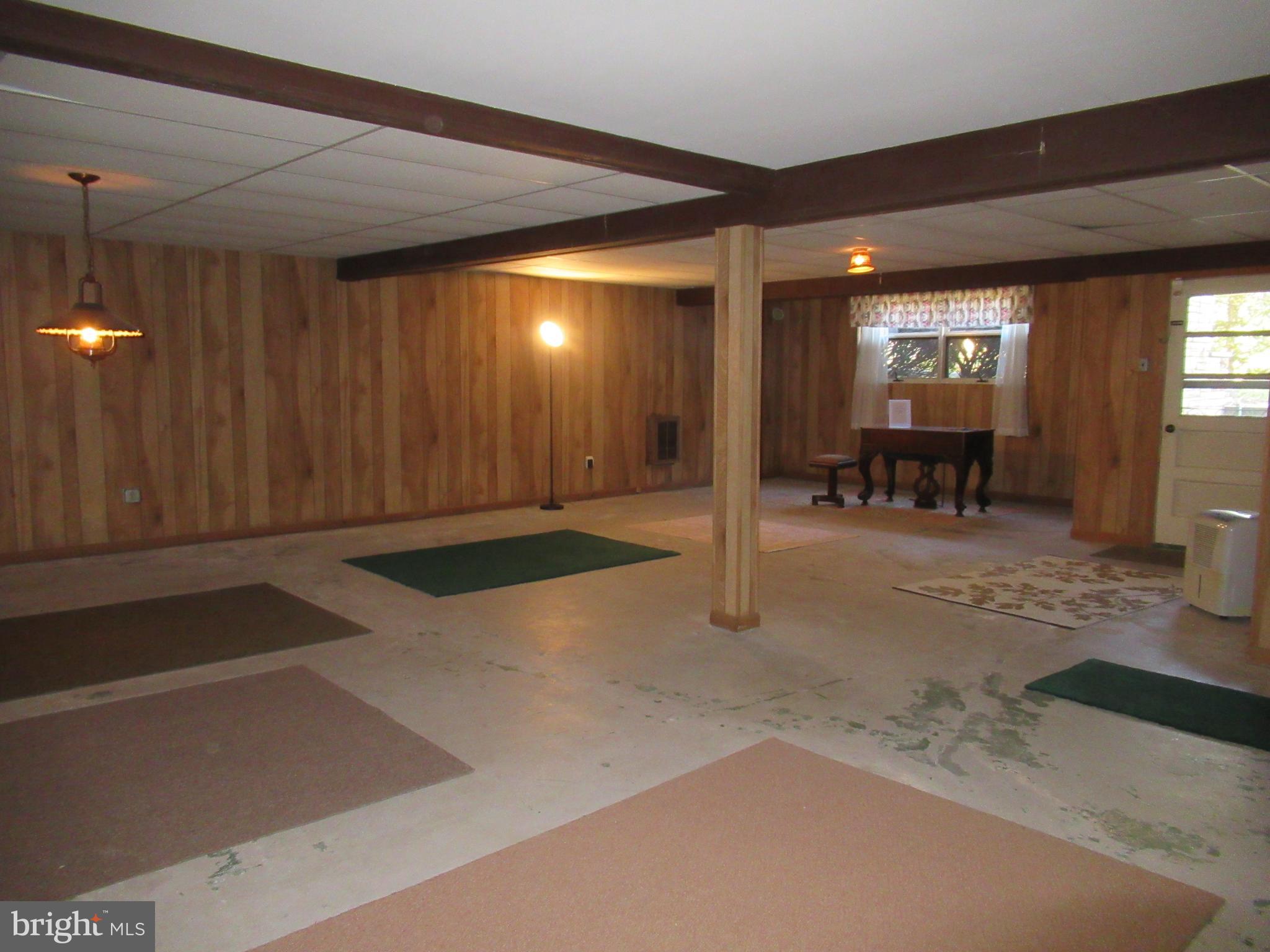 1819 Spring Road Carlisle, PA 17013 - Photo 26 of 30 Large lower level family room - access to outside