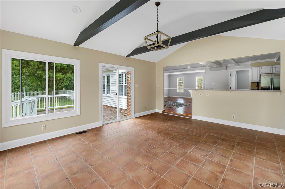 561 Fords Road Manakin-Sabot, VA 23103 - Photo 18 of 33 a view of a big room with wooden floor and windows