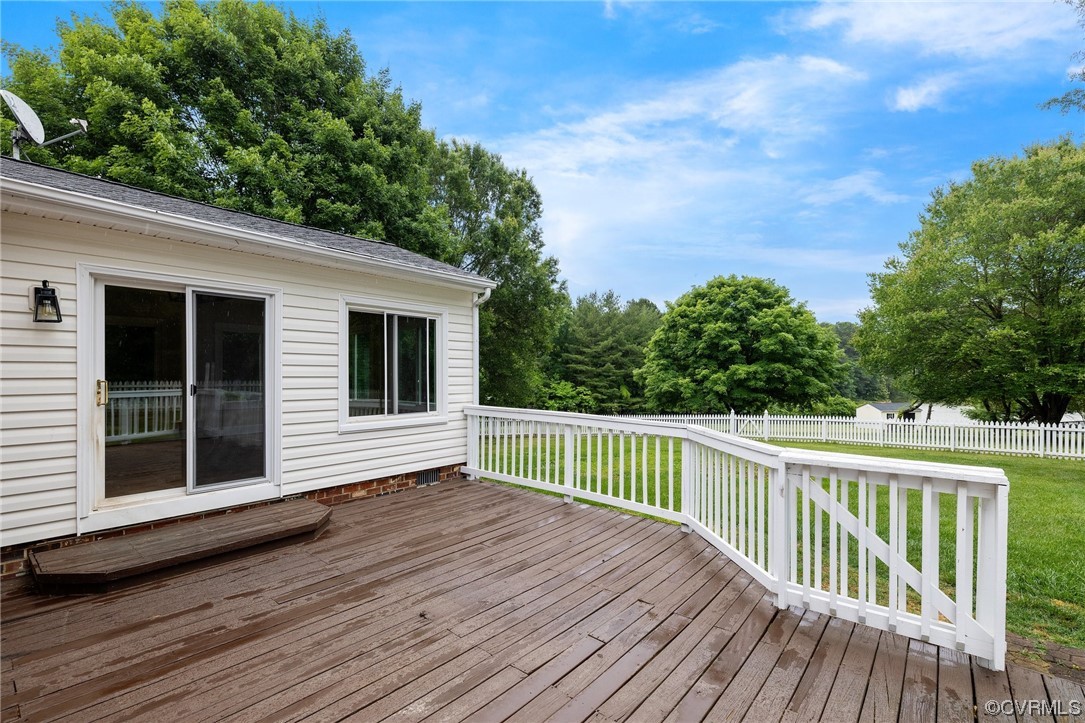 561 Fords Road Manakin-Sabot, VA 23103 - Photo 31 of 33 a view of deck with large trees and wooden fence