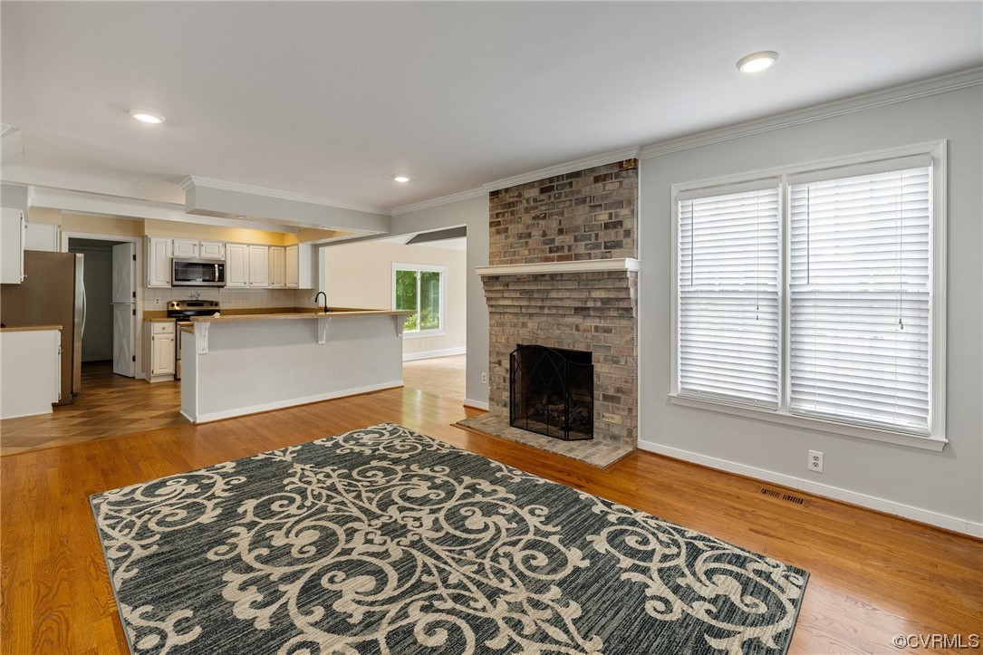 561 Fords Road Manakin-Sabot, VA 23103 - Photo 8 of 33 a kitchen with stainless steel appliances granite countertop a refrigerator and a stove top oven