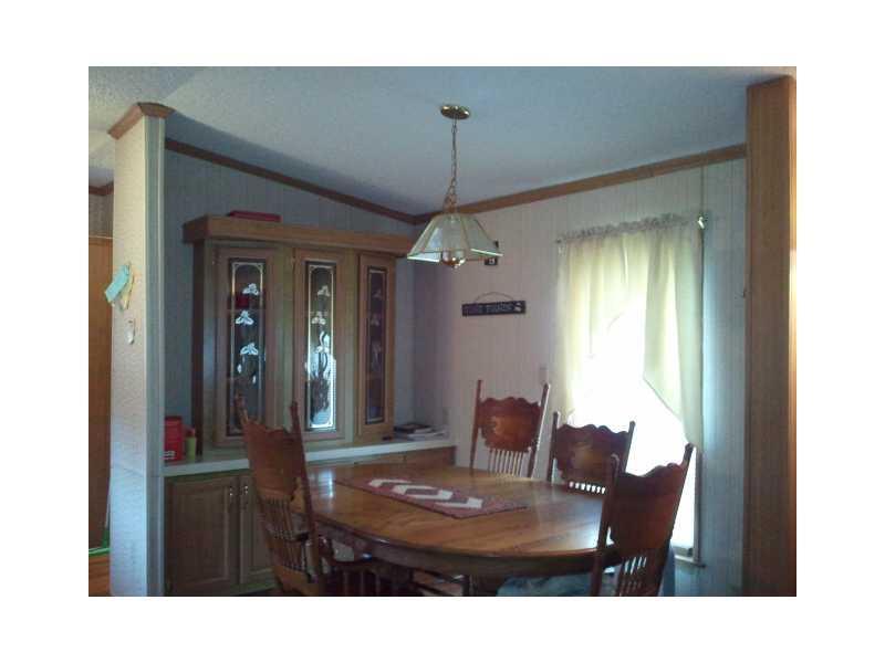 15 Smith Road Lincoln, ME 04457 - Photo 4 of 9 Dining Room. Several nice built ins...