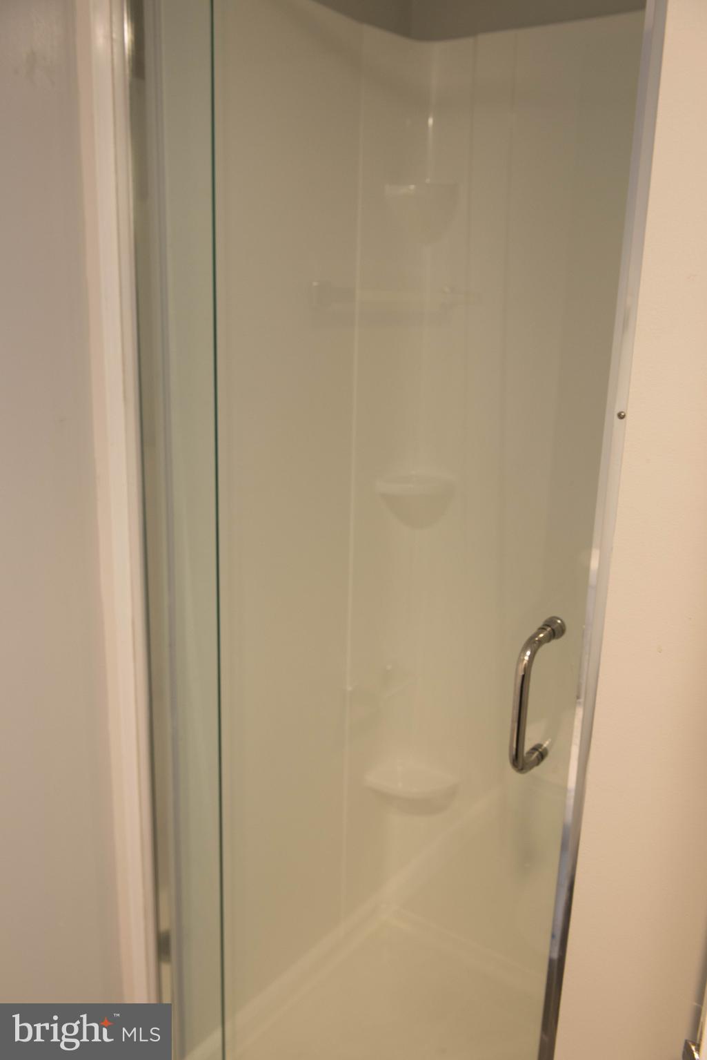 1301 North Courthouse Road, Unit 1507 Arlington, VA 22201 - Photo 27 of 35 a bathroom with a shower