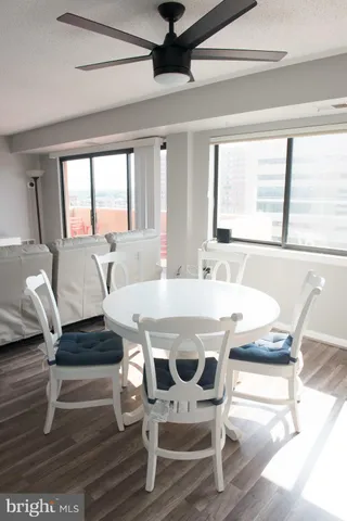 a view of a dining room with furniture window and outside view