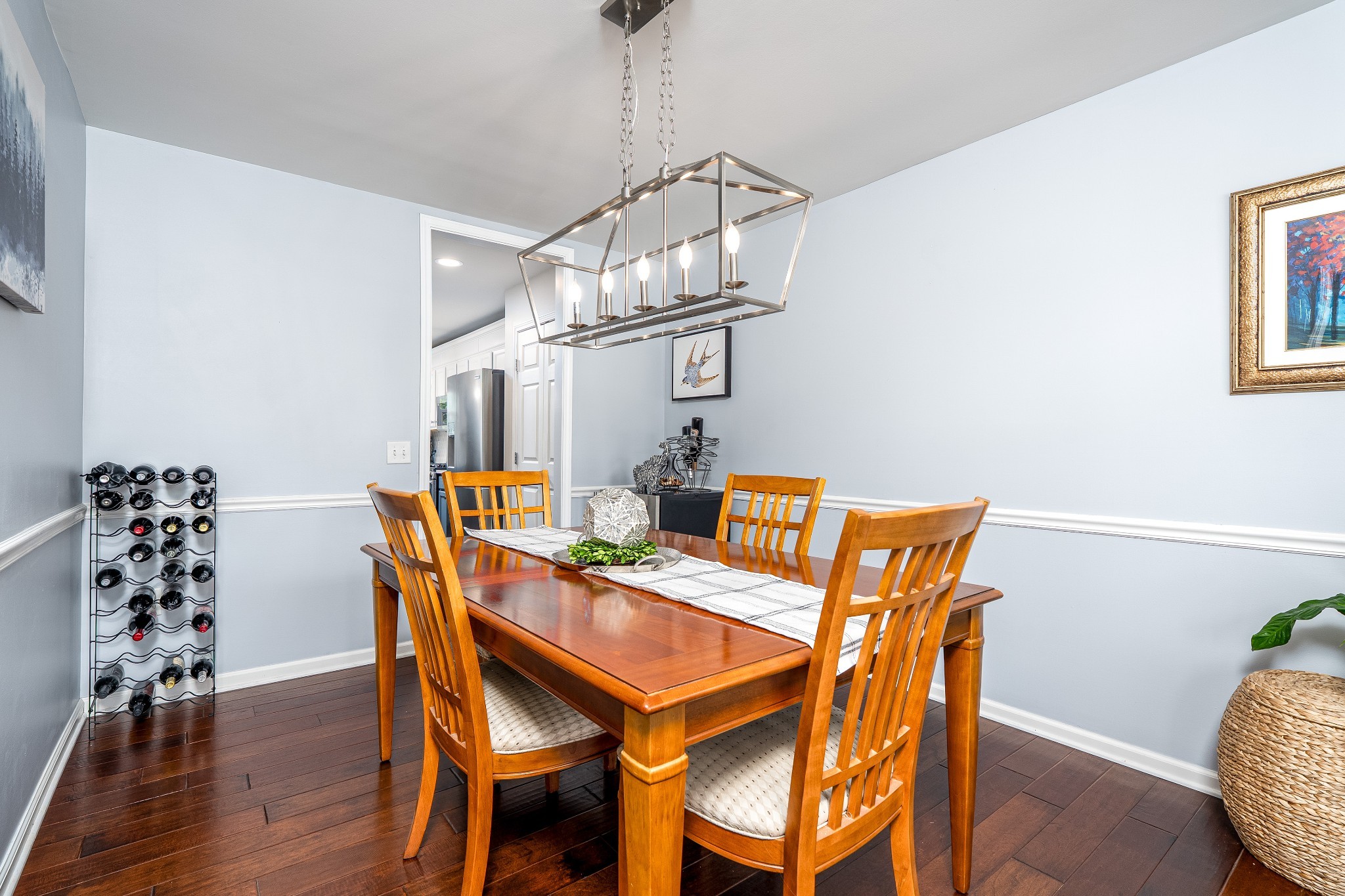 2102 Burgess Lane Spring Hill, TN 37174 - Photo 12 of 45 a view of a dining room with furniture and wooden floor