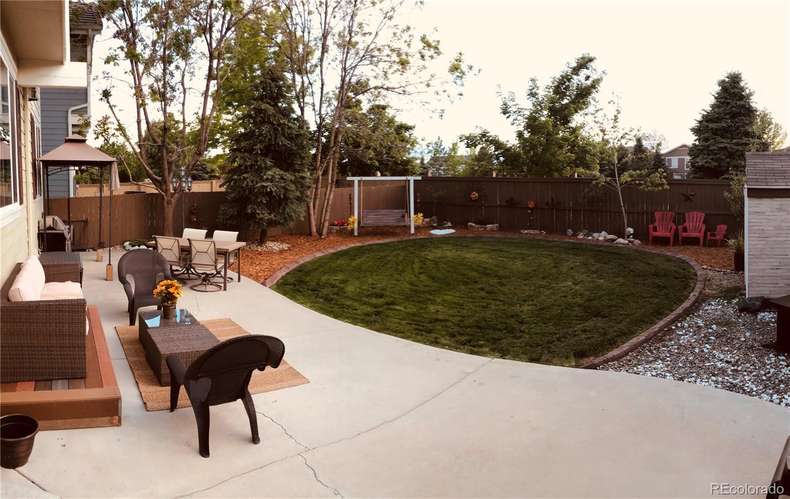 10735 Wynspire Road Highlands Ranch, CO 80130 - Photo 37 of 40 a view of a backyard