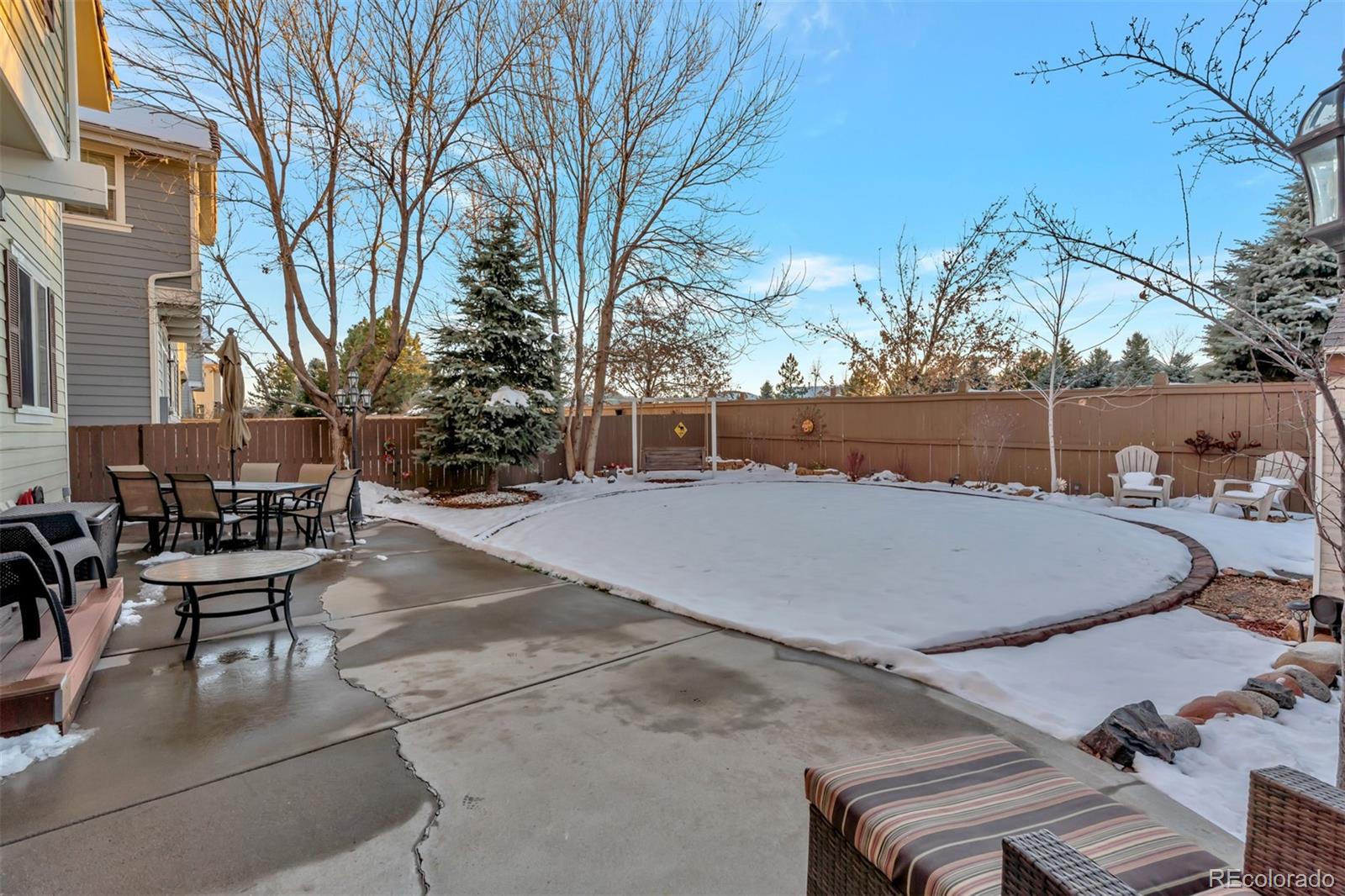 10735 Wynspire Road Highlands Ranch, CO 80130 - Photo 38 of 40 a view of outdoor space yard deck patio and outdoor seating