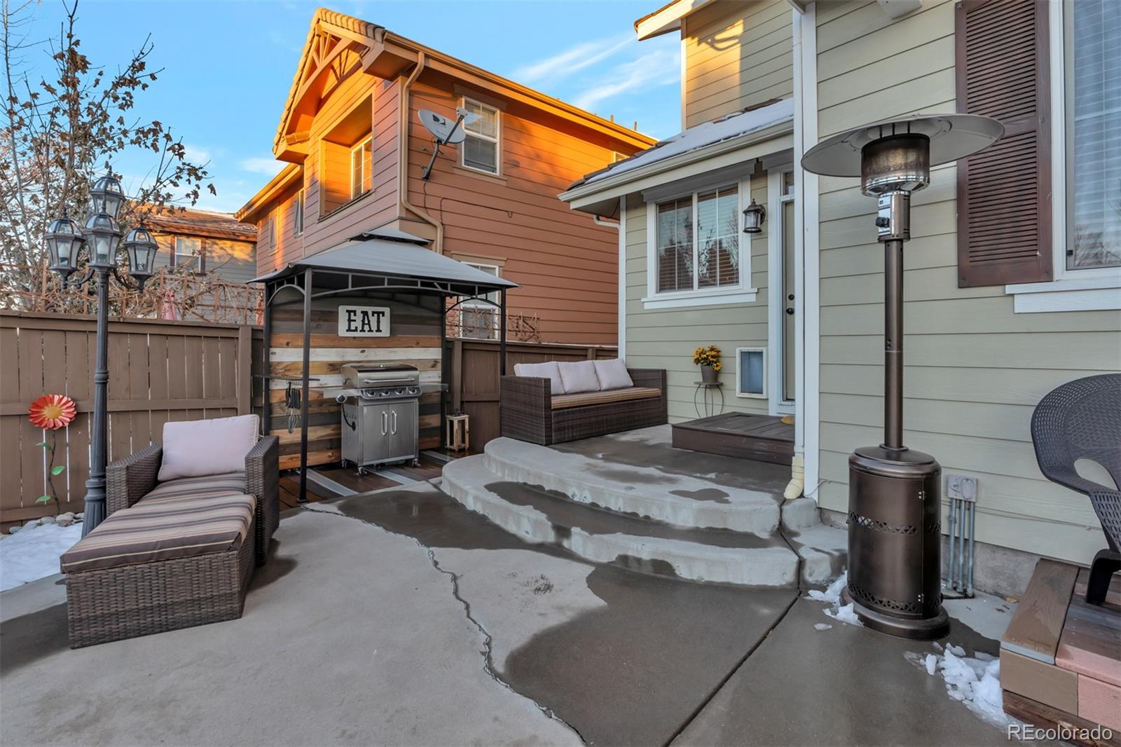 10735 Wynspire Road Highlands Ranch, CO 80130 - Photo 40 of 40 a view of a house with a patio