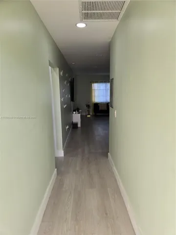 a view of a livingroom and a window