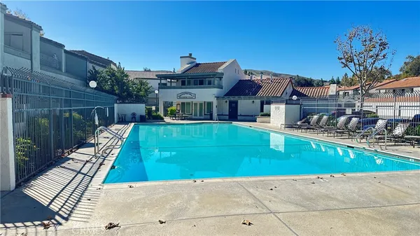 a view of a house with swimming pool
