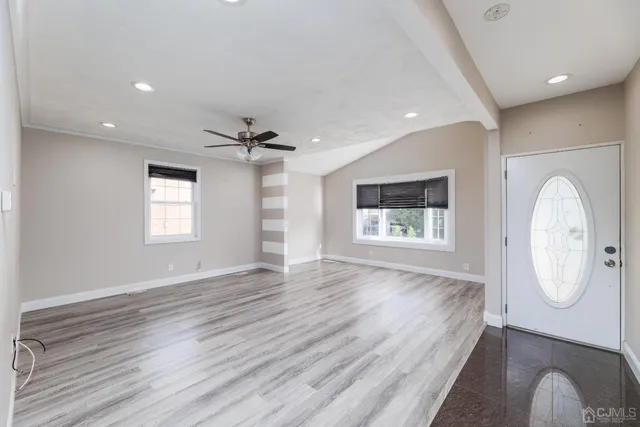 a view of livingroom with furniture and wooden floor