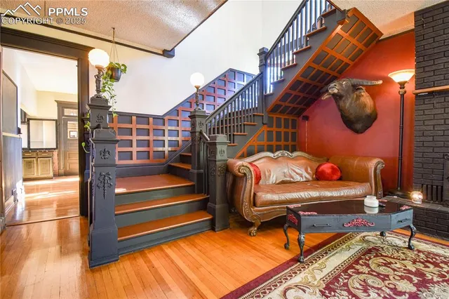 a view of a two chairs in the balcony