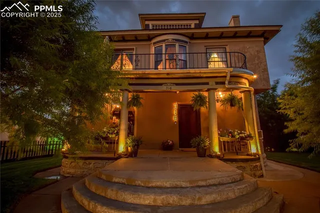 a view of a porch with a potted plant