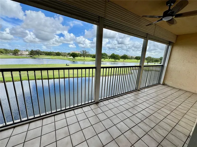a view of balcony with furniture