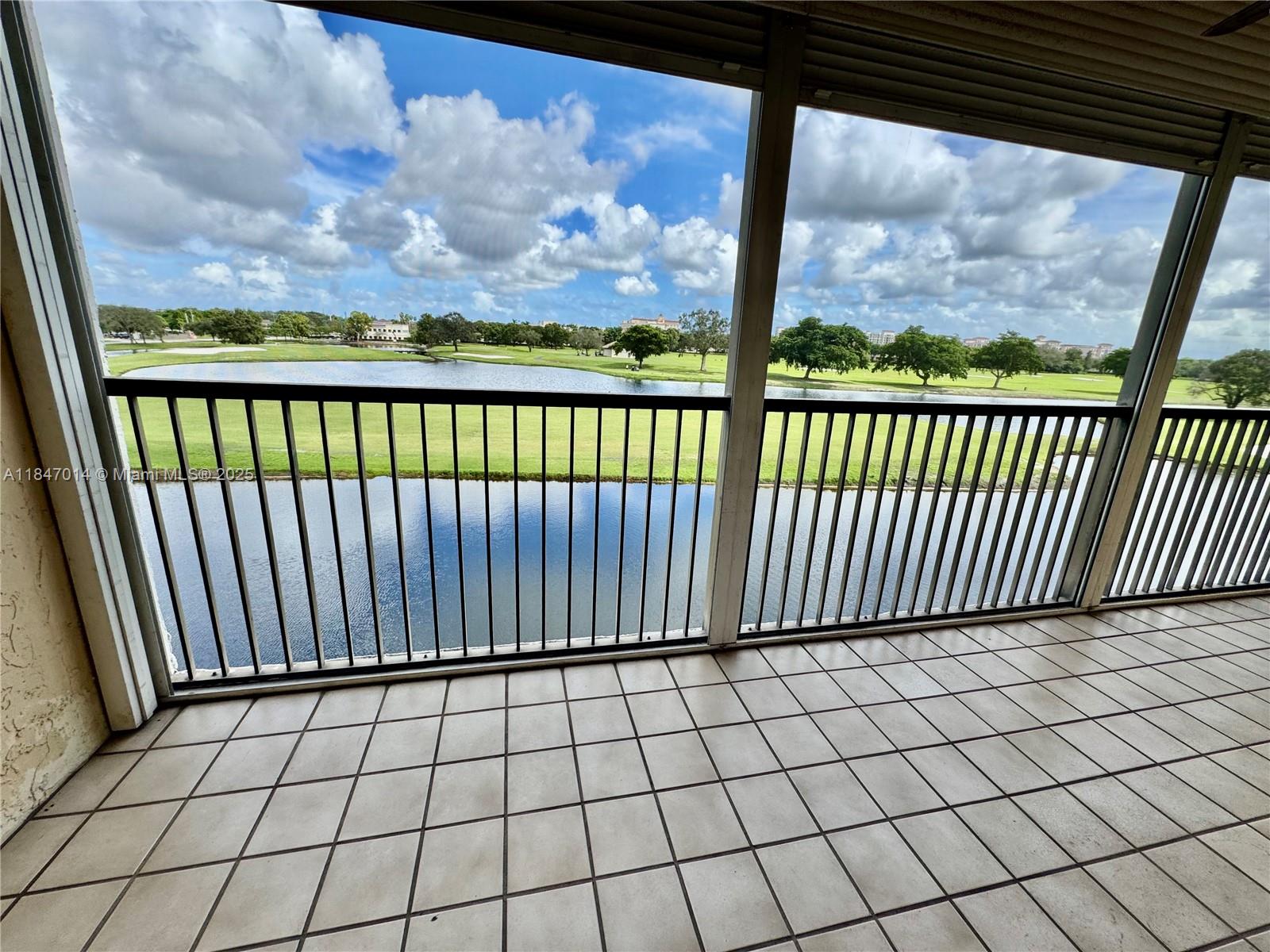 3100 West Rolling Hills Circle, Unit 407 Davie, FL 33328 - Photo 27 of 29 a view of a black gate