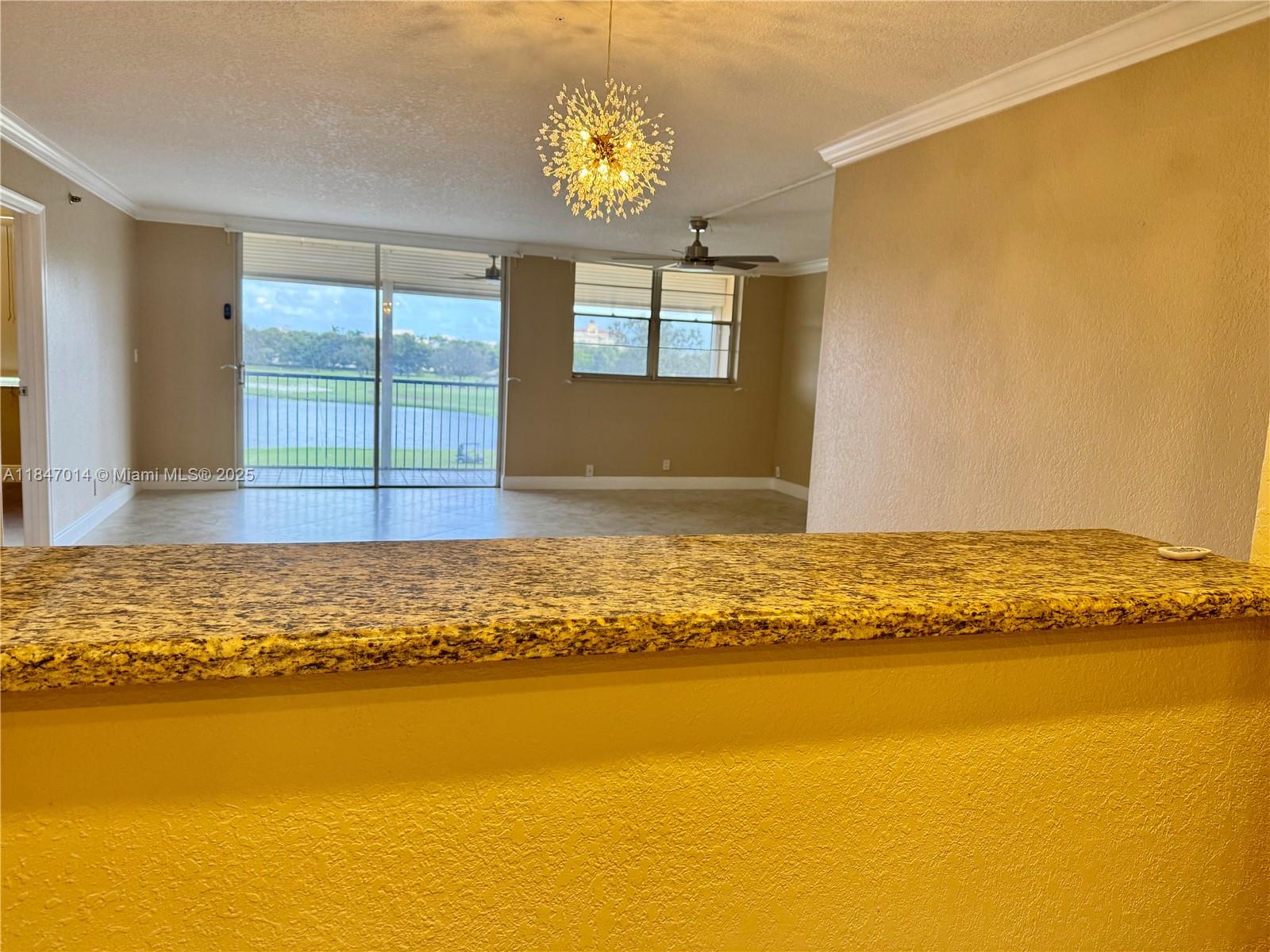 3100 West Rolling Hills Circle, Unit 407 Davie, FL 33328 - Photo 5 of 29 a view of an ocean and beach